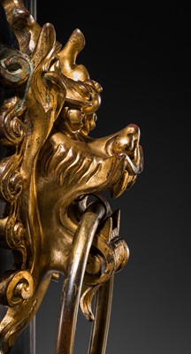 Lot 135 - A RARE GILT-BRONZE ‘BEAST-MASK’ DOOR KNOCKER, QING DYNASTY OR EARLIER
