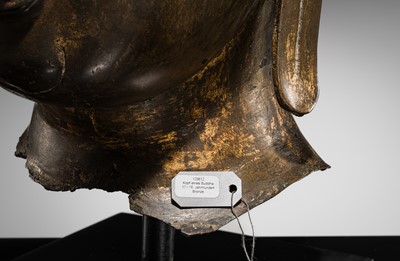 Lot 25 - A MONUMENTAL GILT BRONZE HEAD OF BUDDHA, SUKHOTHAI KINGDOM, 15TH CENTURY