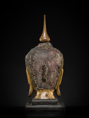 Lot 22 - A VERY LARGE GILT-LACQUERED WOOD HEAD OF BUDDHA, SHAN STYLE, 19TH CENTURY