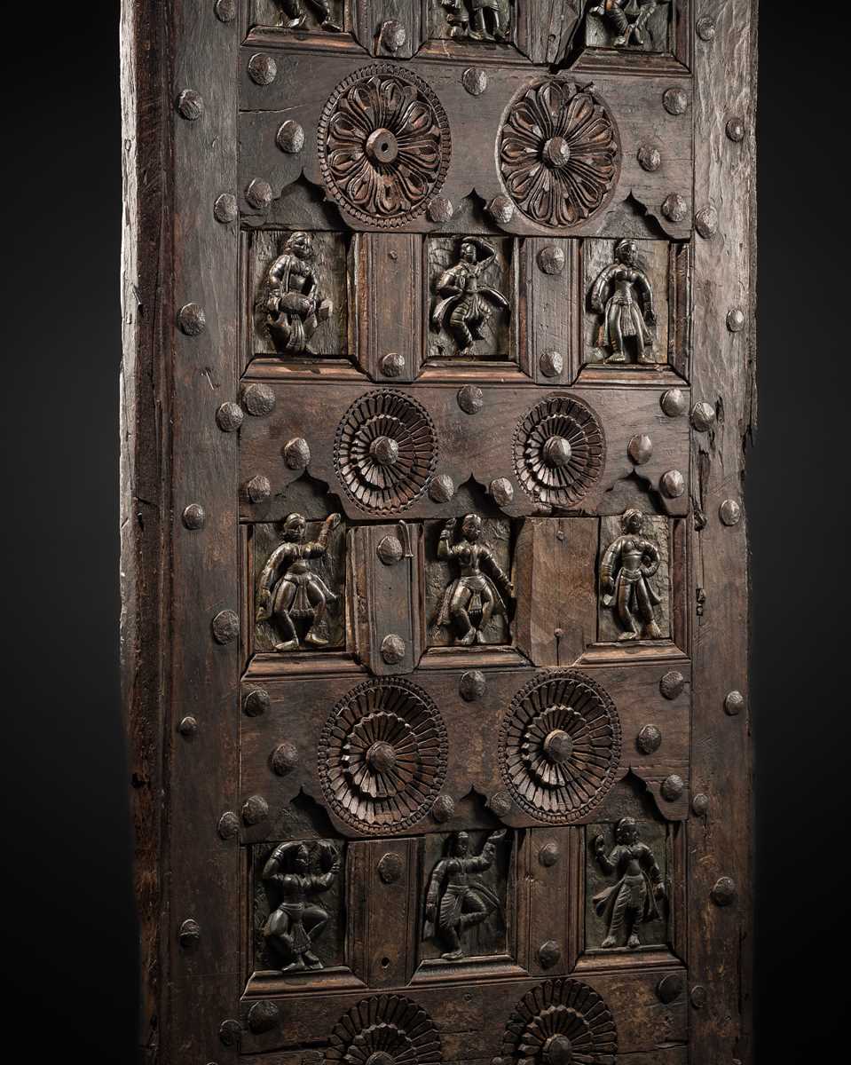 Lot 96 - A COFFERED WOOD DOOR DEPICTING DANCING DEITIES, 19TH TO 20TH CENTURY OR EARLIER