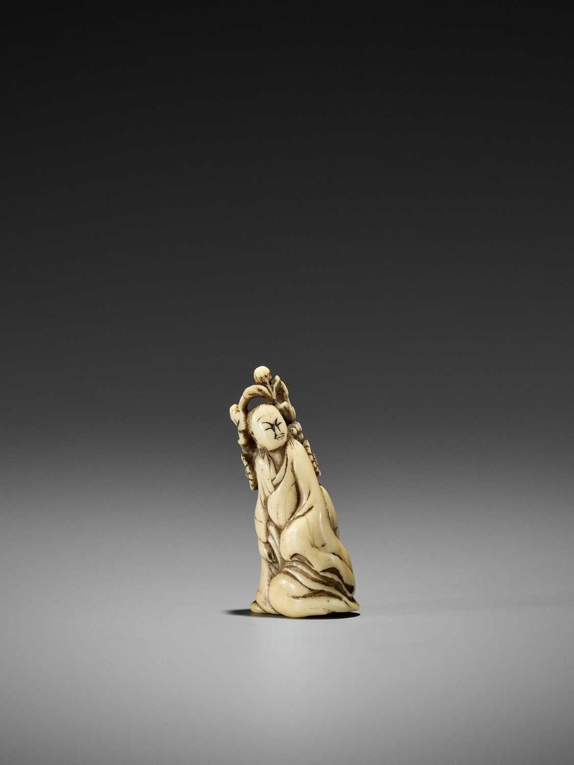 Lot 207 - A RARE AND EARLY STAG ANTLER NETSUKE OF KIKUJIDO