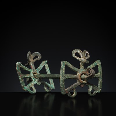 Lot 163 - A BRONZE HORSE BRIDLE WITH ‘IBEX’ CHEEK PIECES, LURISTAN, 9TH-7TH CENTURY BC