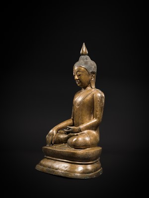 Lot 13 - A LARGE AND EXCEPTIONAL BRONZE FIGURE OF BUDDHA SHAKYAMUNI, SHAN STYLE, 17TH-18TH CENTURY
