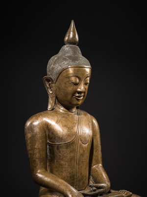 Lot 13 - A LARGE AND EXCEPTIONAL BRONZE FIGURE OF BUDDHA SHAKYAMUNI, SHAN STYLE, 17TH-18TH CENTURY
