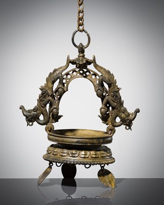 Lot 146 - A HANGING ‘MAKARA’ OIL LAMP, KHADULLU, NEWAR, 19th CENTURY