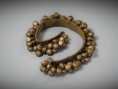 Lot 159 - A LARGE BRASS DANCER’S BELT WITH BELLS, ARAMANI, KERALA, 18TH-19TH CENTURY