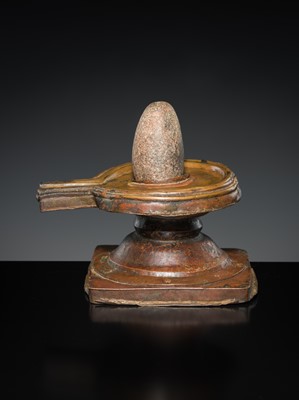 Lot 188 - A STONE LINGAM AND COPPER YONI, INDIA, 19TH CENTURY OR EARLIER
