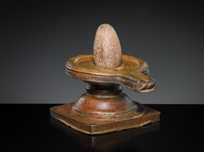 Lot 188 - A STONE LINGAM AND COPPER YONI, INDIA, 19TH CENTURY OR EARLIER