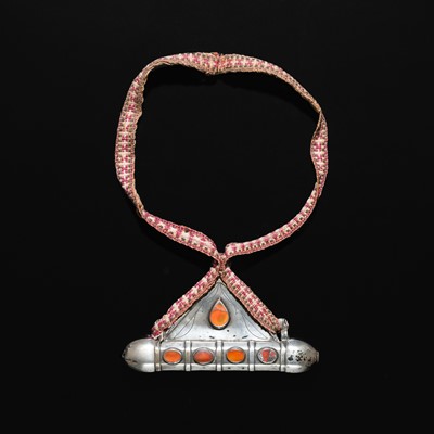 Lot 211 - A TURKMEN CARNELIAN-INLAID METAL AMULET HOLDER, TUMAR, 19TH-EARLY 20TH CENTURY