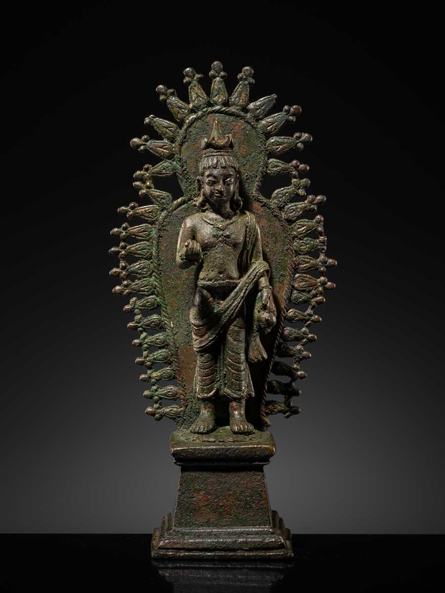Lot 63 - A RARE AND IMPORTANT SILVER-INLAID BRONZE FIGURE OF MAITREYA, POST-GANDHARA, SWAT VALLEY OR KASHMIR, 6TH-7TH CENTURY
