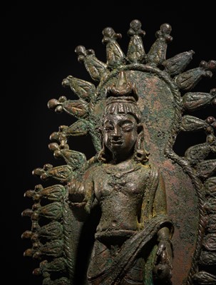 Lot 63 - A RARE AND IMPORTANT SILVER-INLAID BRONZE FIGURE OF MAITREYA, POST-GANDHARA, SWAT VALLEY OR KASHMIR, 6TH-7TH CENTURY