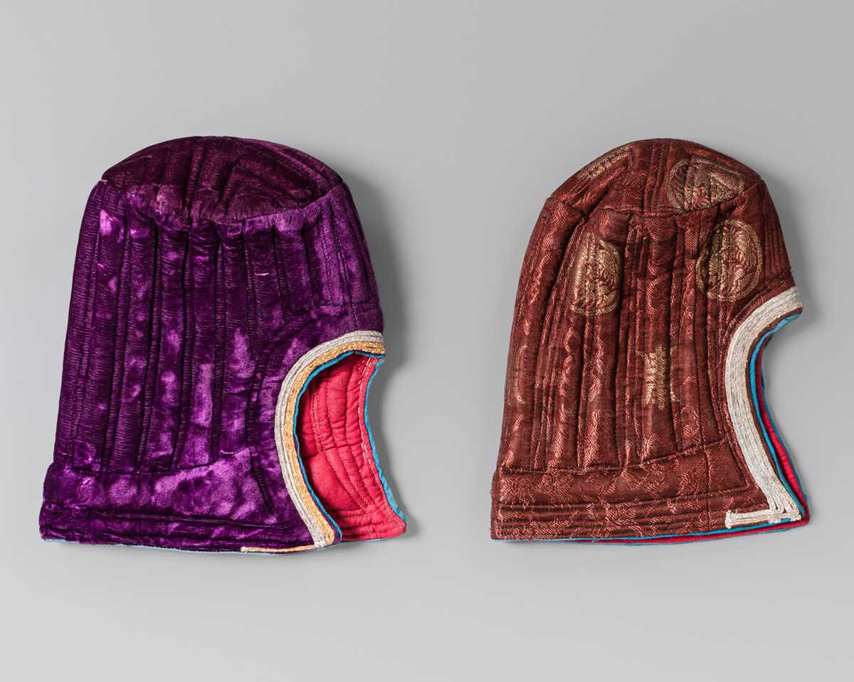 Lot 260 - A GROUP OF TWO QUILTED TRADITIONAL HATS,