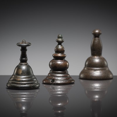 Lot 248 - A GROUP OF THREE BRONZE MINIATURE STUPAS, TIBET, CIRCA 12TH CENTURY