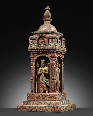 Lot 116 - A GILT AND POLYCHROME STONE STUPA, 19TH TO EARLY 20TH CENTURY