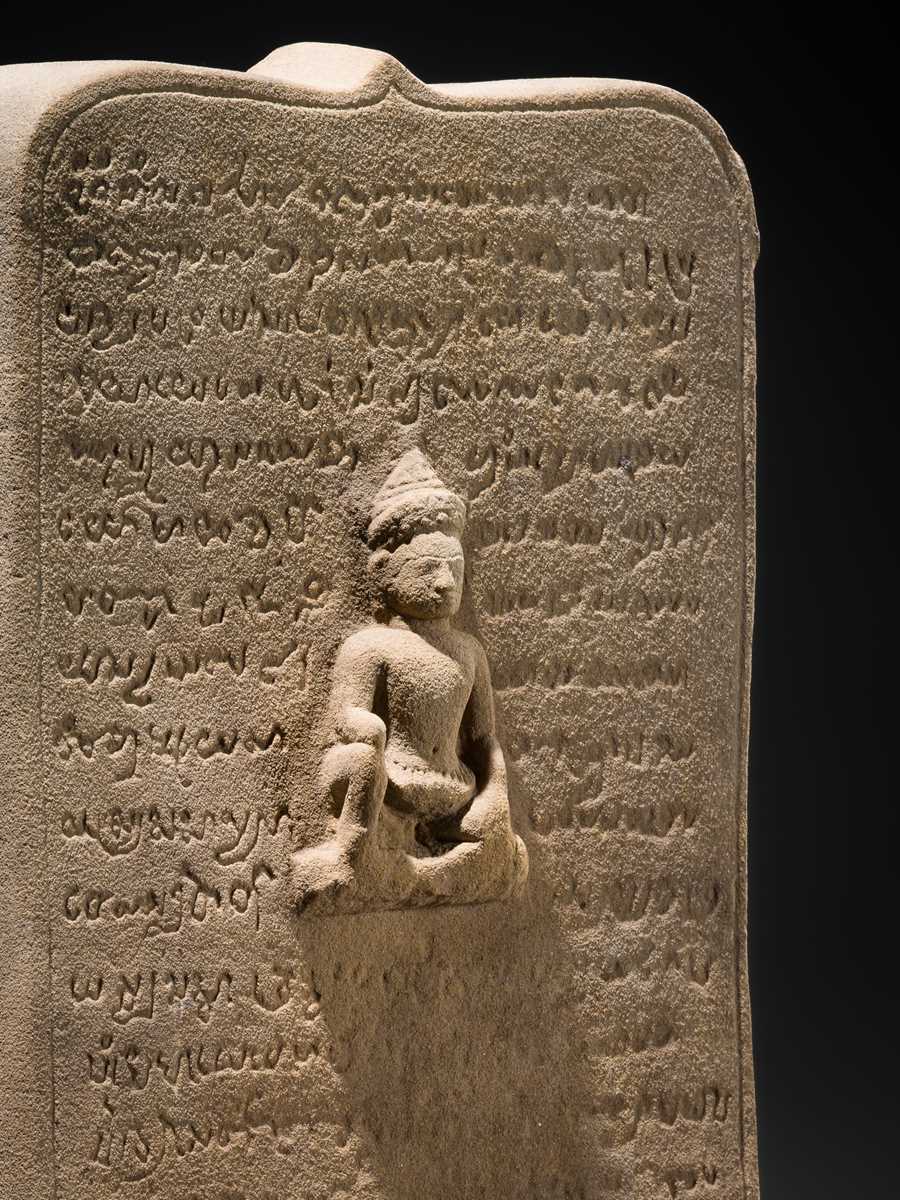 Lot 1 - A RARE KHMER SANDSTONE INSCRIBED STELE, BAPHUON PERIOD, 11TH CENTURY
