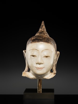 Lot 146 - A BLACK-LACQUERED WHITE MARBLE HEAD OF BUDDHA, SHAN STYLE, 18TH-19TH CENTURY