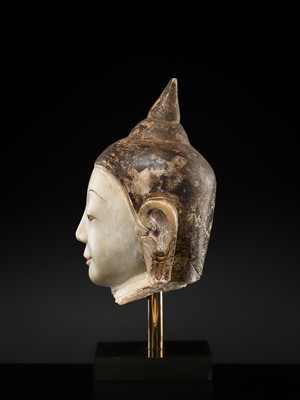 Lot 146 - A BLACK-LACQUERED WHITE MARBLE HEAD OF BUDDHA, SHAN STYLE, 18TH-19TH CENTURY