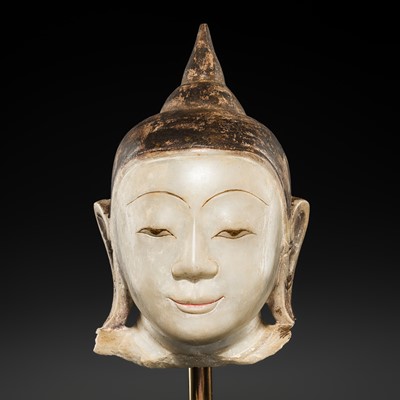Lot 146 - A BLACK-LACQUERED WHITE MARBLE HEAD OF BUDDHA, SHAN STYLE, 18TH-19TH CENTURY