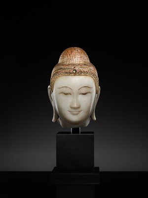 Lot 20 - A GILT-LACQUERED AND GLASS INLAID WHITE ALABASTER HEAD OF BUDDHA, MANDALAY, 18TH-19TH CENTURY
