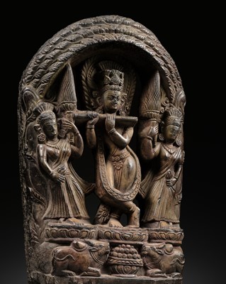 Lot 78 - A GREEN STONE STELE OF KRISHNA VENUGOPALA, NEPAL, CIRCA 17TH CENTURY