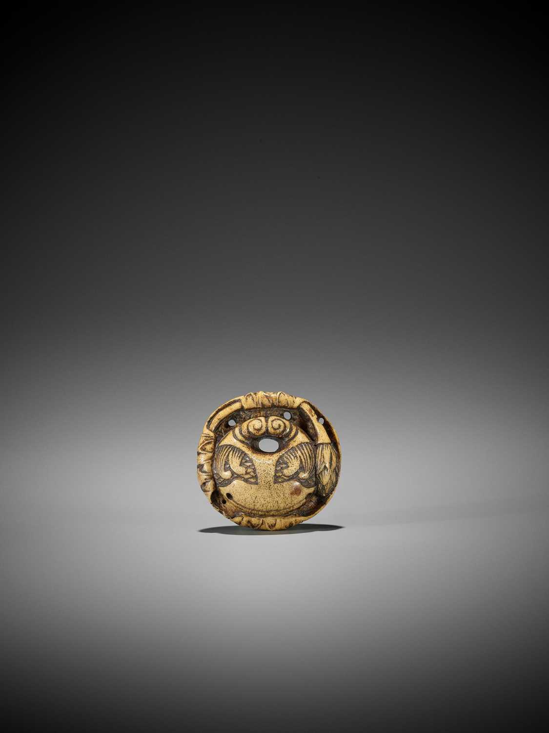 Lot 213 - A FINE STAG ANTLER MANJU NETSUKE WITH MOKUGYO AND LOTUS