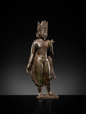 Lot 66 - A LARGE SILVER-INLAID BRONZE FIGURE OF THE CROWNED BUDDHA, KASHMIR, 9TH-10TH CENTURY