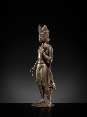Lot 66 - A LARGE SILVER-INLAID BRONZE FIGURE OF THE CROWNED BUDDHA, KASHMIR, 9TH-10TH CENTURY