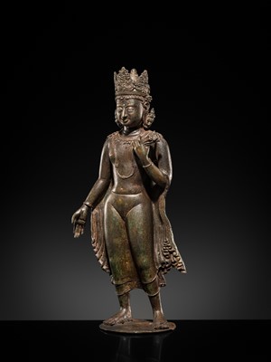 Lot 66 - A LARGE SILVER-INLAID BRONZE FIGURE OF THE CROWNED BUDDHA, KASHMIR, 9TH-10TH CENTURY