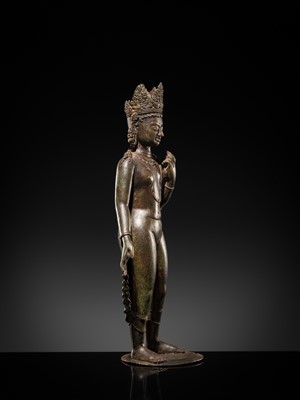 Lot 66 - A LARGE SILVER-INLAID BRONZE FIGURE OF THE CROWNED BUDDHA, KASHMIR, 9TH-10TH CENTURY