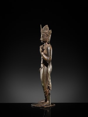 Lot 66 - A LARGE SILVER-INLAID BRONZE FIGURE OF THE CROWNED BUDDHA, KASHMIR, 9TH-10TH CENTURY