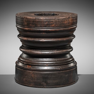 Lot 243 - A LARGE WOOD LINGAM STAND, 19TH CENTURY