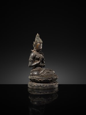 Lot 50 - A BRONZE FIGURE OF VAIROCANA, CENTRAL JAVA, 9TH-11TH CENTURY
