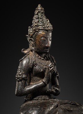 Lot 50 - A BRONZE FIGURE OF VAIROCANA, CENTRAL JAVA, 9TH-11TH CENTURY