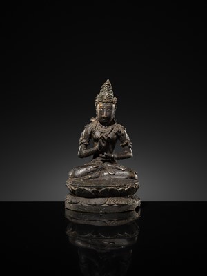 Lot 50 - A BRONZE FIGURE OF VAIROCANA, CENTRAL JAVA, 9TH-11TH CENTURY