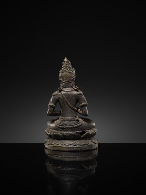 Lot 50 - A BRONZE FIGURE OF VAIROCANA, CENTRAL JAVA, 9TH-11TH CENTURY