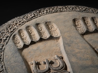 Lot 60 - A SCHIST RELIEF OF THE FOOTPRINTS OF BUDDHA, BUDDHAPADA, 4TH-5TH CENTURY OR EARLIER