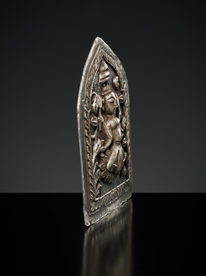 Lot 201 - A GROUP OF TWO SILVER REPOUSSÉ AMULET PENDANTS AND A PILGRIMAGE PLAQUE, 19TH-EARLY 20TH CENTURY