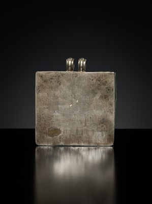 Lot 201 - A GROUP OF TWO SILVER REPOUSSÉ AMULET PENDANTS AND A PILGRIMAGE PLAQUE, 19TH-EARLY 20TH CENTURY
