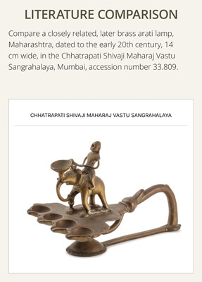 Lot 180 - A BRONZE ‘ELEPHANT AND MAHOUT’ ARATI LAMP, MAHARASHTRA