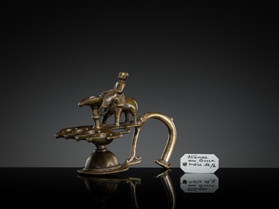 Lot 180 - A BRONZE ‘ELEPHANT AND MAHOUT’ ARATI LAMP, MAHARASHTRA