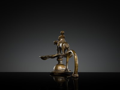 Lot 180 - A BRONZE ‘ELEPHANT AND MAHOUT’ ARATI LAMP, MAHARASHTRA