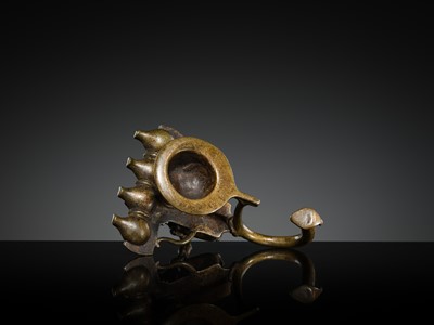 Lot 180 - A BRONZE ‘ELEPHANT AND MAHOUT’ ARATI LAMP, MAHARASHTRA