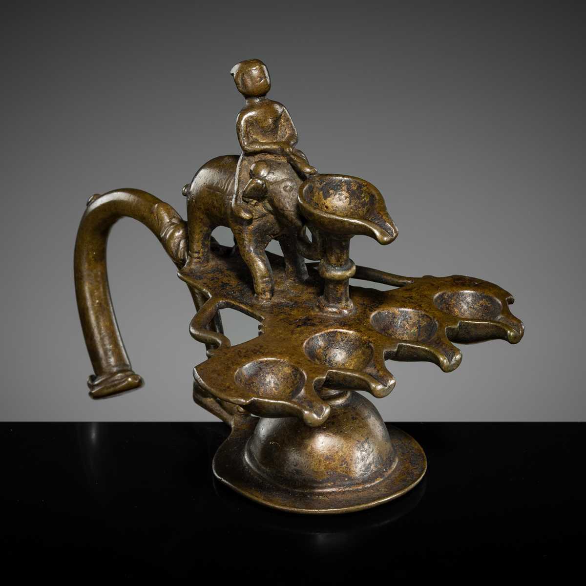 Lot 180 - A BRONZE ‘ELEPHANT AND MAHOUT’ ARATI LAMP, MAHARASHTRA
