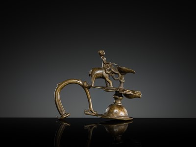 Lot 180 - A BRONZE ‘ELEPHANT AND MAHOUT’ ARATI LAMP, MAHARASHTRA