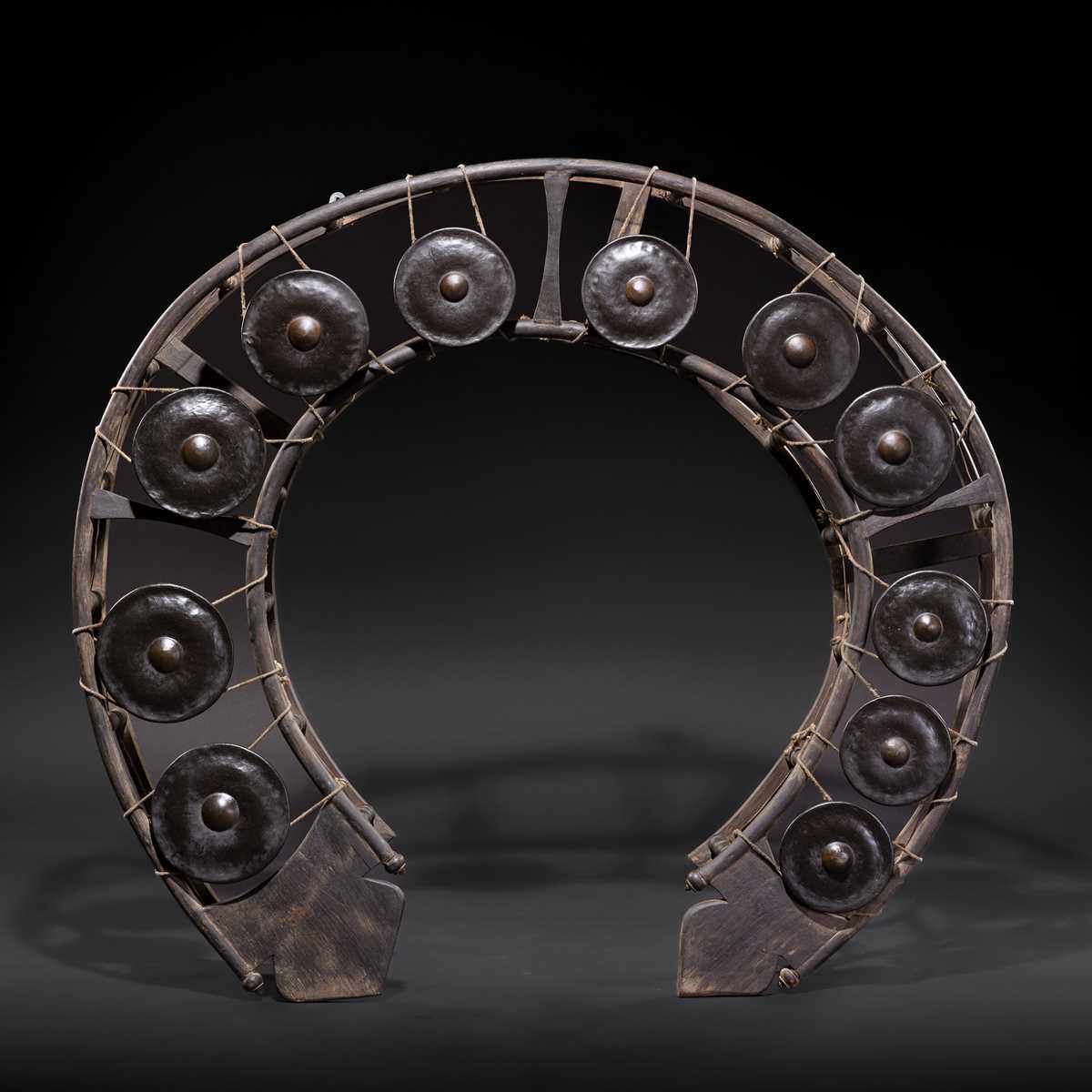 Lot 44 - A LARGE WOOD AND METAL GONG CIRCLE, KHONG WONG