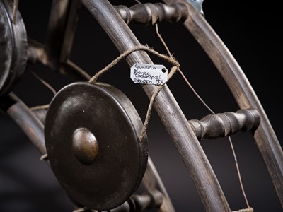 Lot 44 - A LARGE WOOD AND METAL GONG CIRCLE, KHONG WONG