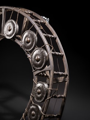 Lot 44 - A LARGE WOOD AND METAL GONG CIRCLE, KHONG WONG