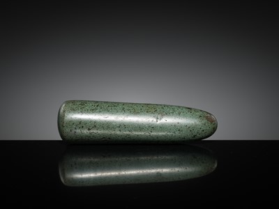 Lot 189 - A DARK GREEN STONE EYE-SHAPED MORTAR AND PESTLE