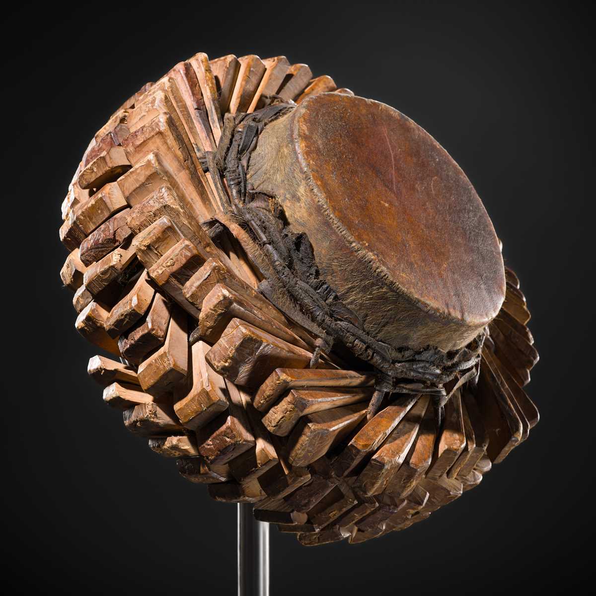 Lot 53 - A LEATHER AND WOOD WEDGE DRUM, LAMBA, SUMBA ISLAND, 19TH-20TH CENTURY