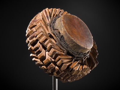Lot 53 - A LEATHER AND WOOD WEDGE DRUM, LAMBA, SUMBA ISLAND, 19TH-20TH CENTURY